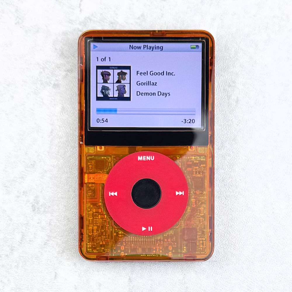 iPod 5th Generation 128GB, 2000mAh, Transparent Orange Faceplate, U2 Special Edition Backplate - Image 1